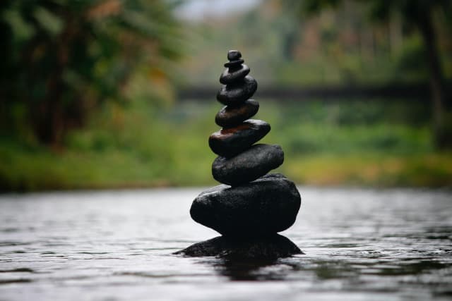 Stones balanced in the river
